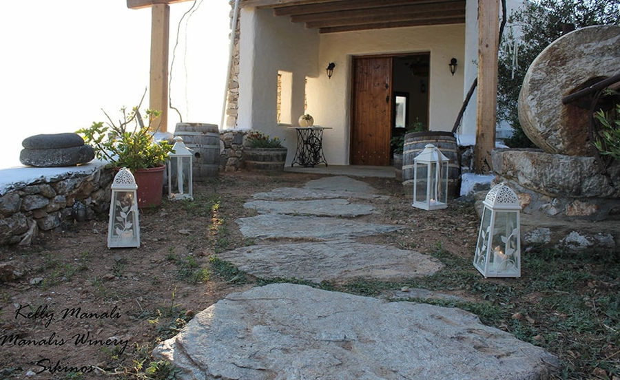 lanterns on the ground on the sides at entrance at 'Manalis Winery'